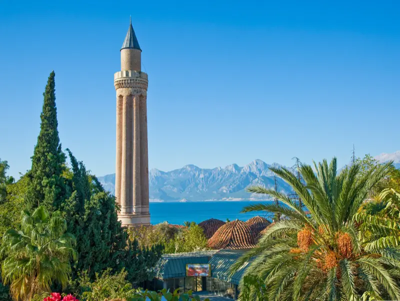 The fluted Yivli Minaret with the Taurus mountains behind it